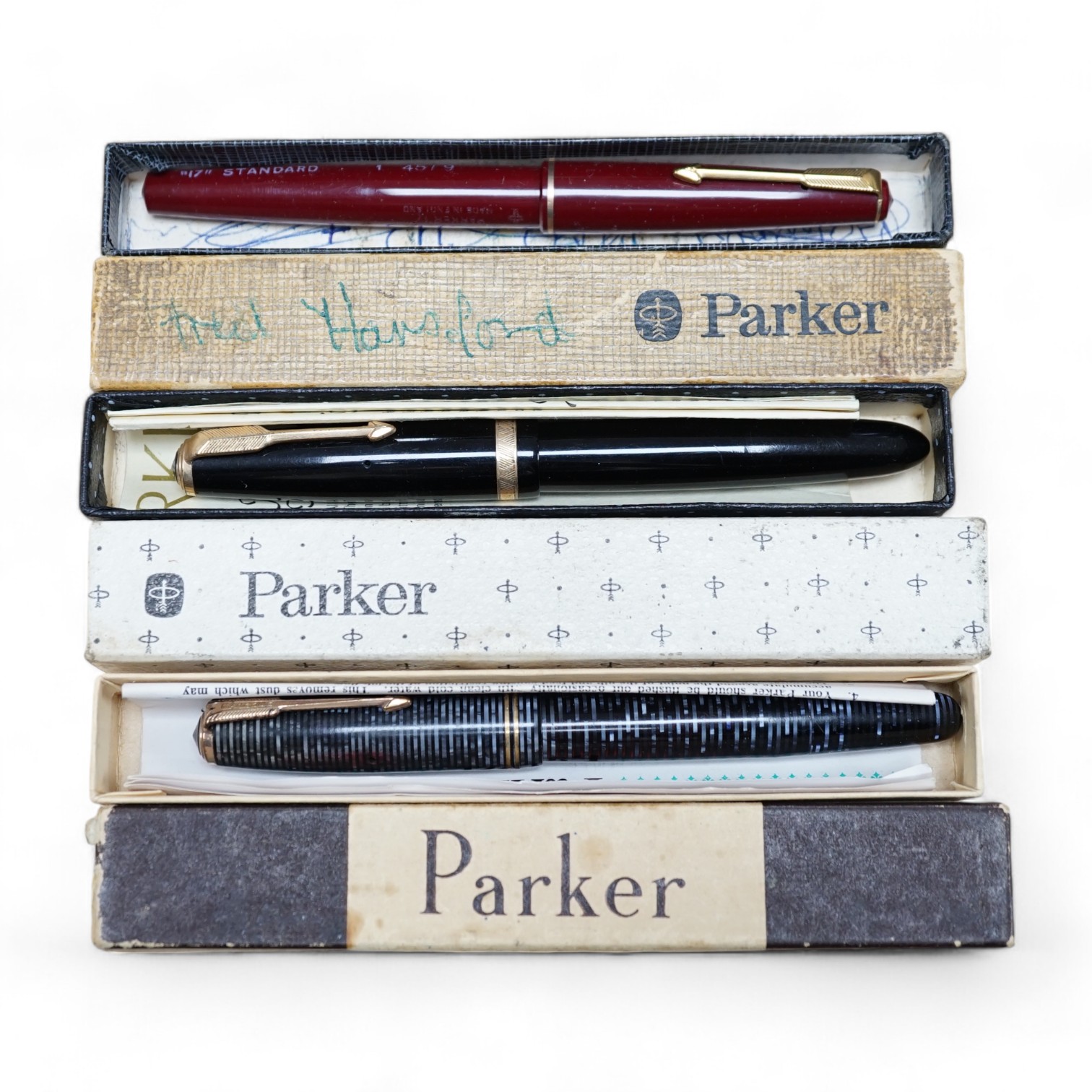 Eight boxed Parker fountain pens and fourteen others unboxed, a lady's Rotary wristwatch and silver pendant. Condition - fair